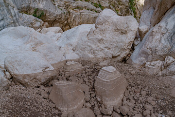 Very high rocky banks of Gorropu Canyon with a view of its bottom