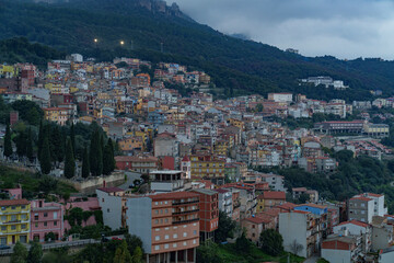 Fototapeta premium A view of a very densely built-up town, hidden in the middle of a forest.