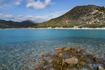 The beautiful color of the Sardinian sea right next to the shore