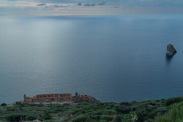 Beautiful view, from a higher perspective of the sea panorama with an abandoned building in the foreground