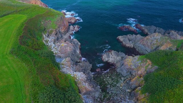Aerial view from a drone of the coastal landscape and crops in the area around Cabo Cebes in Tapia de Casariego. Asturias. Spain. Europe