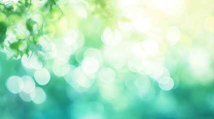 Obraz premium Abstract blurred background featuring a bright sunny sky and soft bokeh texture evoking feelings of relaxation and tranquility with a gradient of pastel mint green and teal hues