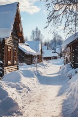 Fototapeta premium A serene snowy pathway between two wooden buildings, perfect for winter scenes or rural landscapes
