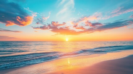 Fototapeta premium Dramatic sunset sky with shades of blue orange pink yellow and purple over a beach A picturesque natural landscape during the golden hour with twilight hues at dusk