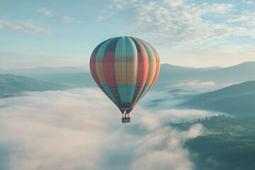 Obraz premium Colorful hot air balloon soaring high in the sky
