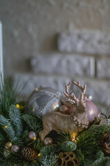 Christmas decoration with Deer statuette, and accessories in festive home decor.