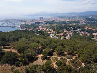 Obraz premium Aerial cityscape view of beach and Mediterranean Sea along Costa Brava in Palamos Catalonia