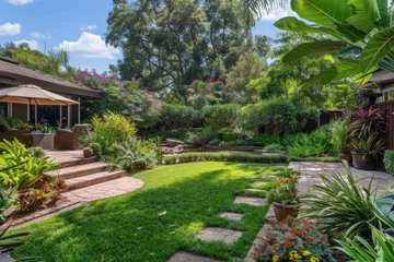 Poster de jardin 3D Beautiful landscaped backyard with lush gardens  © Vorda Berge