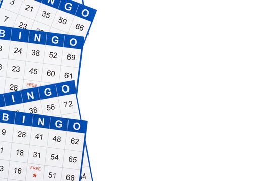 Blue and white bingo game cards on white background. Empty space for copy space. - Powered by Adobe
