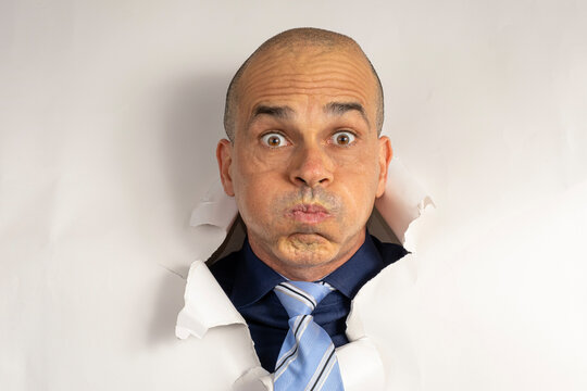 48 year old man in casual clothing and tie, only his head on a cardboard, showing emotions_5.