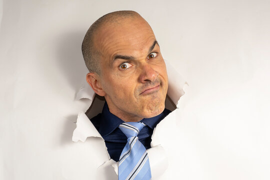 48 year old man in casual clothing and tie, only his head on a cardboard, showing emotions_7.