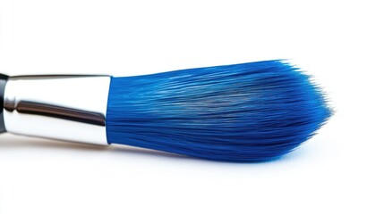 Fototapeta premium Close-Up of a Makeup Brush with Vibrant Blue Bristles on a Clean White Background Ideal for Beauty and Cosmetics Industry Representations and Advertisements