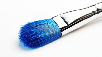 Fototapeta premium Close-up of a Paint Brush with Bright Blue Bristles Perfect for Arts and Crafts Projects, Creative Painting Techniques, and DIY Artistic Expressions