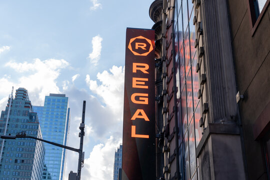 New York City, USA - August 18, 2022: Regal Cinemas logo sign on the building at Times Square in New York City, USA. Regal Cinemas is an American movie theater chain.  