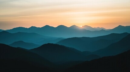 Obraz premium Dramatic mountain silhouette against sunset or sunrise. Majestic mountain silhouette. Nature