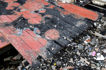 BANGKOK, THAILAND - November 15, 2024: Debris from a house after a fire caused by an electrical...