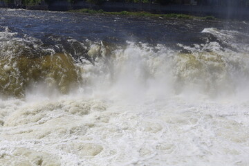The threshold of the waterfall. The rushing water.