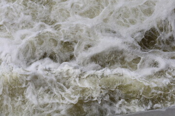 The threshold of the waterfall. The rushing water.