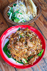 one of most favorite and famous Asian Thai street fast food in hot pan, Pad Thai (Phad Thai), is...