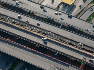 Obraz premium Top up aerial drone view of elevated road and traffic junctions metropolis Bangkok city.