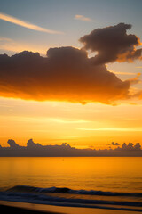 Fototapeta premium Sunset, Sky clouds over sea in the Evening with Orange, Yellow Gold sunlight in Golden hour and Dramatic fluffy, Horizon sea Summer sky landscape, Dusk sky background