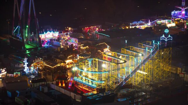 HAMBURG, GERMANY, Nov 13th, 2024: Time lapse, aerial view of Hamburger Dom. The Hamburger Dom is a large fair held at Heiligengeistfeld fair ground in central Hamburg, Germany