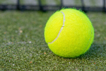 tennis background Close-up shots of tennis balls in tennis courts With a mesh as a blurred...