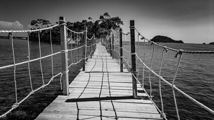 Obraz premium Zakynthos August 2024, amazing multicolored and surprising landscapes, wooden rope bridge leading to the Cameo island 