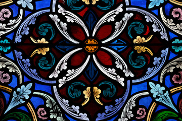 Saint Ferreol church.  Stained glass window. Decorative stained glass window with floral geometric pattern Saint Fargeau.  France.