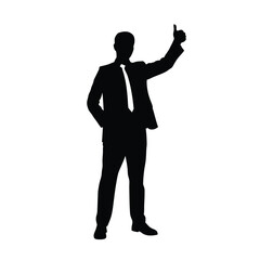 Obraz premium A man in a suit is standing in front of a white background. He is wearing black shoes and a black jacket
