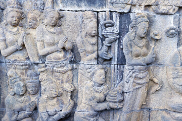 Obraz premium Borobudur, 9th-century Mahayana Buddhist temple. UNESCO World Heritage. Bas-relief dispicting the life of Buddha. Java. Indonesia.
