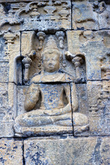 Obraz premium Borobudur, 9th-century Mahayana Buddhist temple. UNESCO World Heritage. Bas-relief dispicting the life of Buddha. Java. Indonesia.
