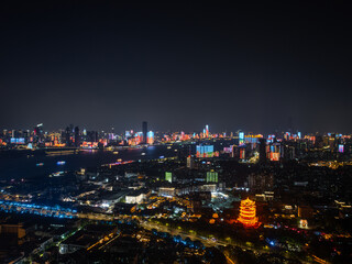 Fototapeta premium Night view of the landmark city on the two rivers and four banks of Wuhan, China