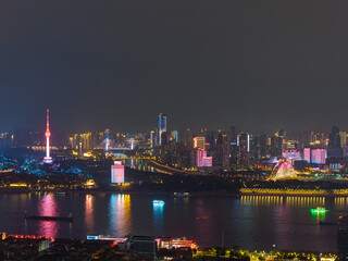 Fototapeta premium Night view of the landmark city on the two rivers and four banks of Wuhan, China