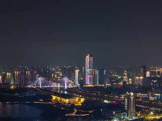 Fototapeta premium Night view of the landmark city on the two rivers and four banks of Wuhan, China