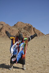 Obraz premium Local mongolian shaman is spiritually connected to his ancestors