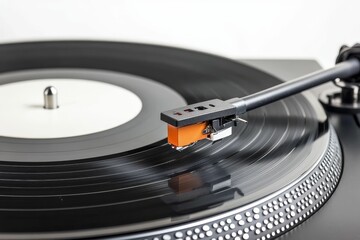 Turntable needle playing a vinyl record.