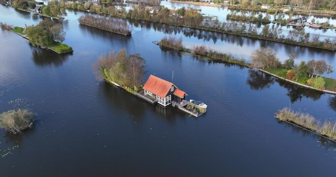 loosdrechtse plassen, water village, house on water, nature of The Netherlands. Breukelen, Scheendijk, aerial drone view.