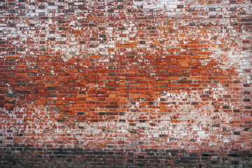 Brick wall. A beautiful pattern of an old worn brick wall. Closed up pattern of a masonry background. Brickswork