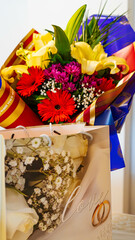 Bouquet of Many Colourful Flowers with paper  wedding bag .