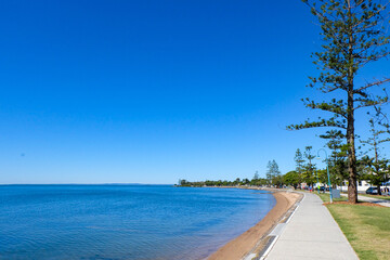 Walking along the seaside at Wynnum jetty and Manly, a beautiful sunny clear and blue sky day 