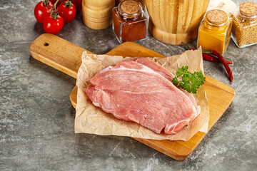 Raw pork schnitzel for cooking