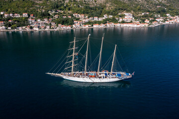 aerial view on Kotor bay with sailor ship