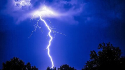 Fototapeta premium Lightning, electric thunderbolt strike of blue colour during night storm, impact, crack, magical energy flash. Thunderstorm flash on black background
