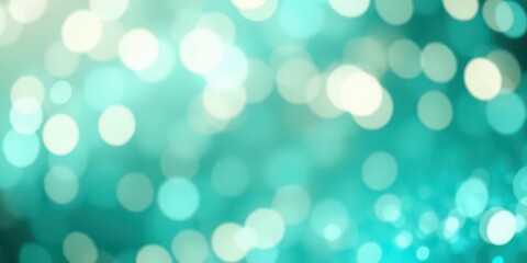 Obraz premium Abstract aqua turquoise and teal green bokeh glitter sparkle background with shimmering lights and soft focus effect, glitter