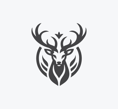 Deer logo design. Heraldic deer emblem illustration. Deer head silhouette