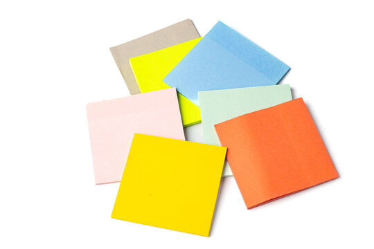 Colorful sticky notes on a white background.