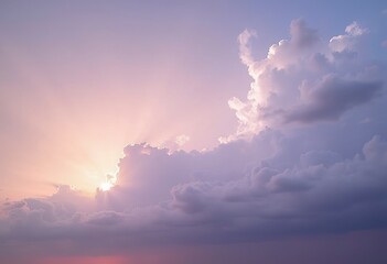 Naklejka premium Dramatic cloudy sky with sun peeking through the clouds