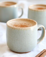 Obraz premium Homemade Healthy Hot Chocolate Served in Elegant Mugs During a Peaceful Cacao Ceremony