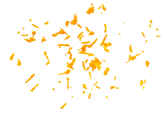 Fresh grated orange peel flying isolated on white, top view